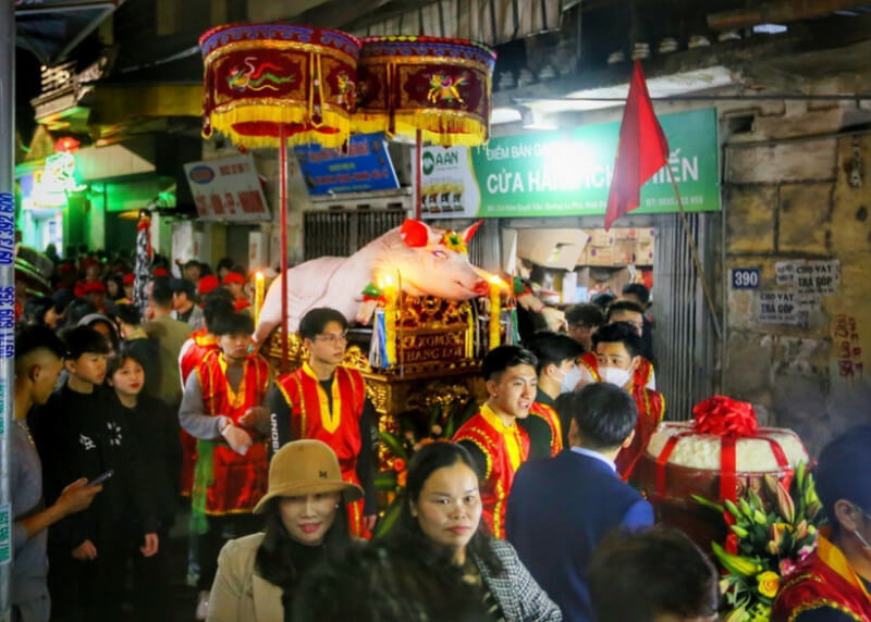 Festival procession of "man pig" in La Phu village