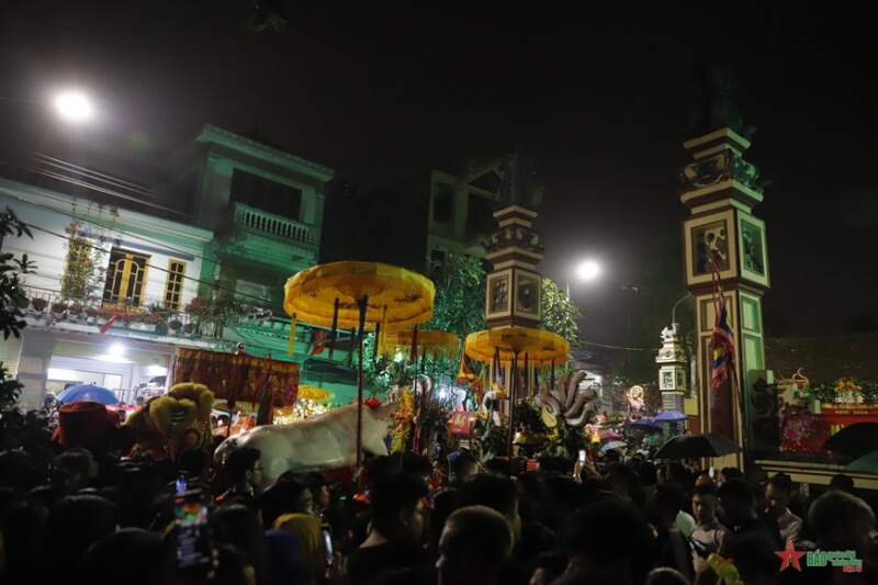 Festival procession of "man pig" in La Phu village