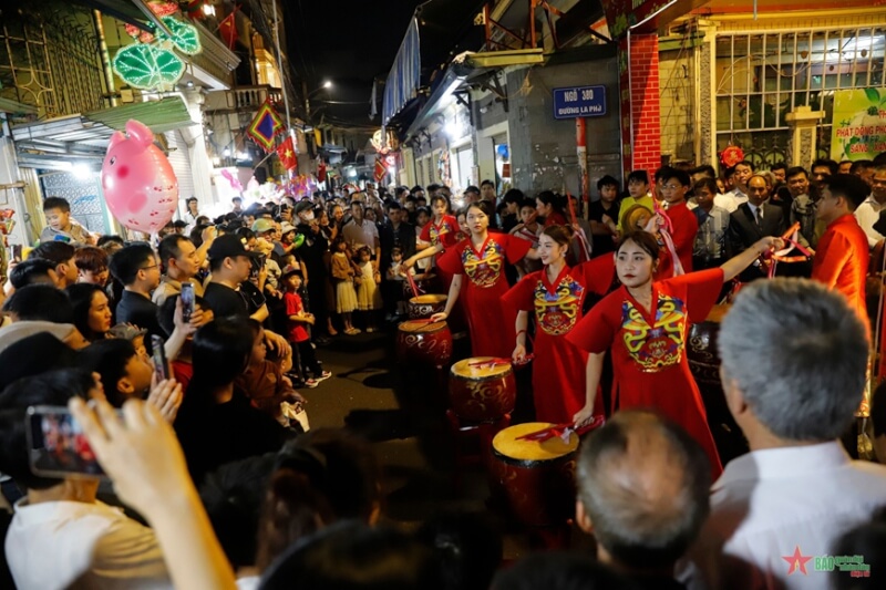 Festival procession of "man pig" in La Phu village