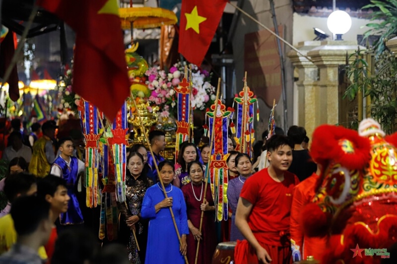 Festival procession of "man pig" in La Phu village